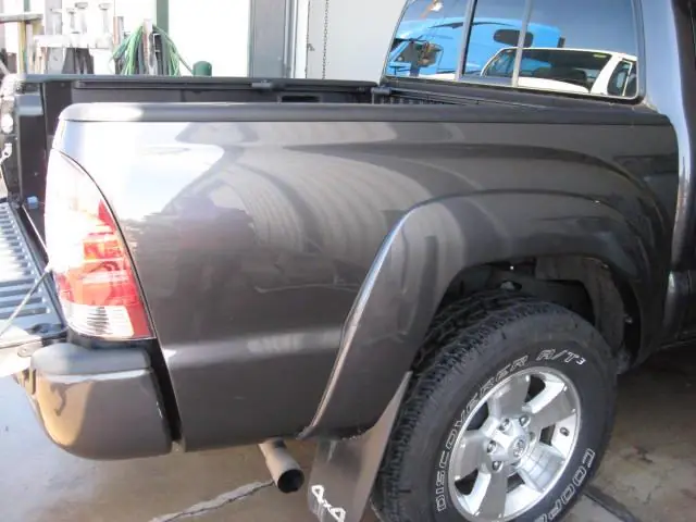 The finished grey Tacoma bedside, painted and reassembled with the wheel arch and tail lamp back in place